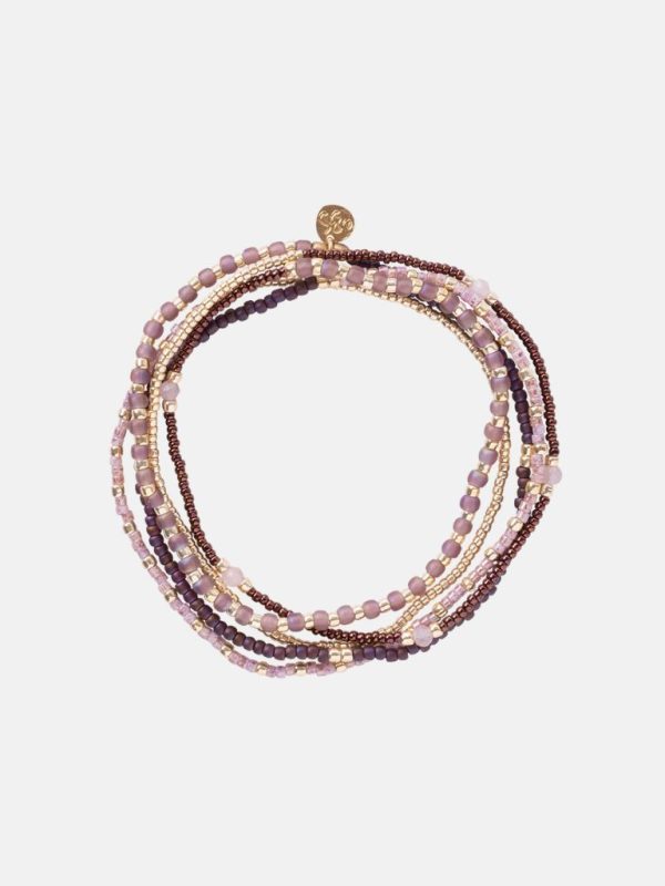 Bracelet dans les tons rose, or et rouge-violet avec petit pendentif en or