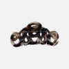 Handmade hair clip from the brand Bon Dep in brown tone with lettering "love